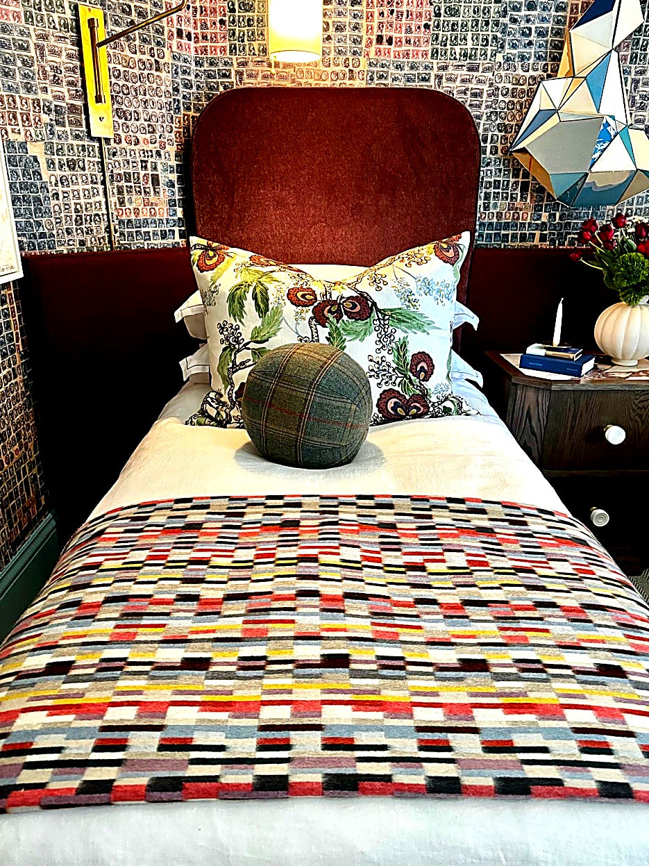 Lark + Palm Showcase &mdash; Twin bed angle with floral euro sham and ball pillow