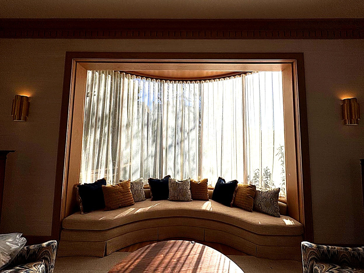 Perry D. Smith &mdash; Bay window sheer draperies with cushioned window seat
