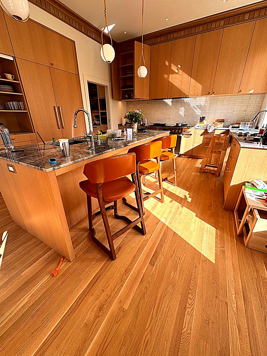 Perry D. Smith &mdash; Kitchen overview with leather stools